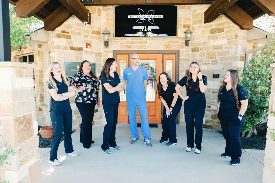 Mineral Wells Dental team in front of their office, Four Seasons Dental.
			