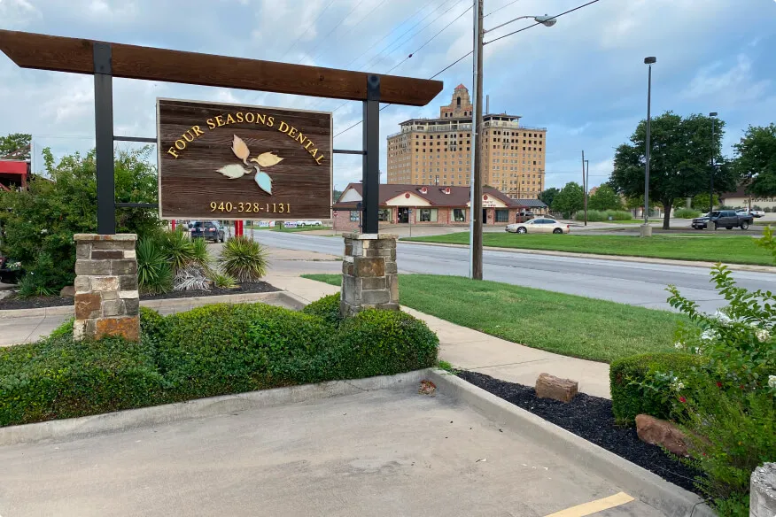 Exterior sign for Four Seasons Dental in Mineral Wells, TX.