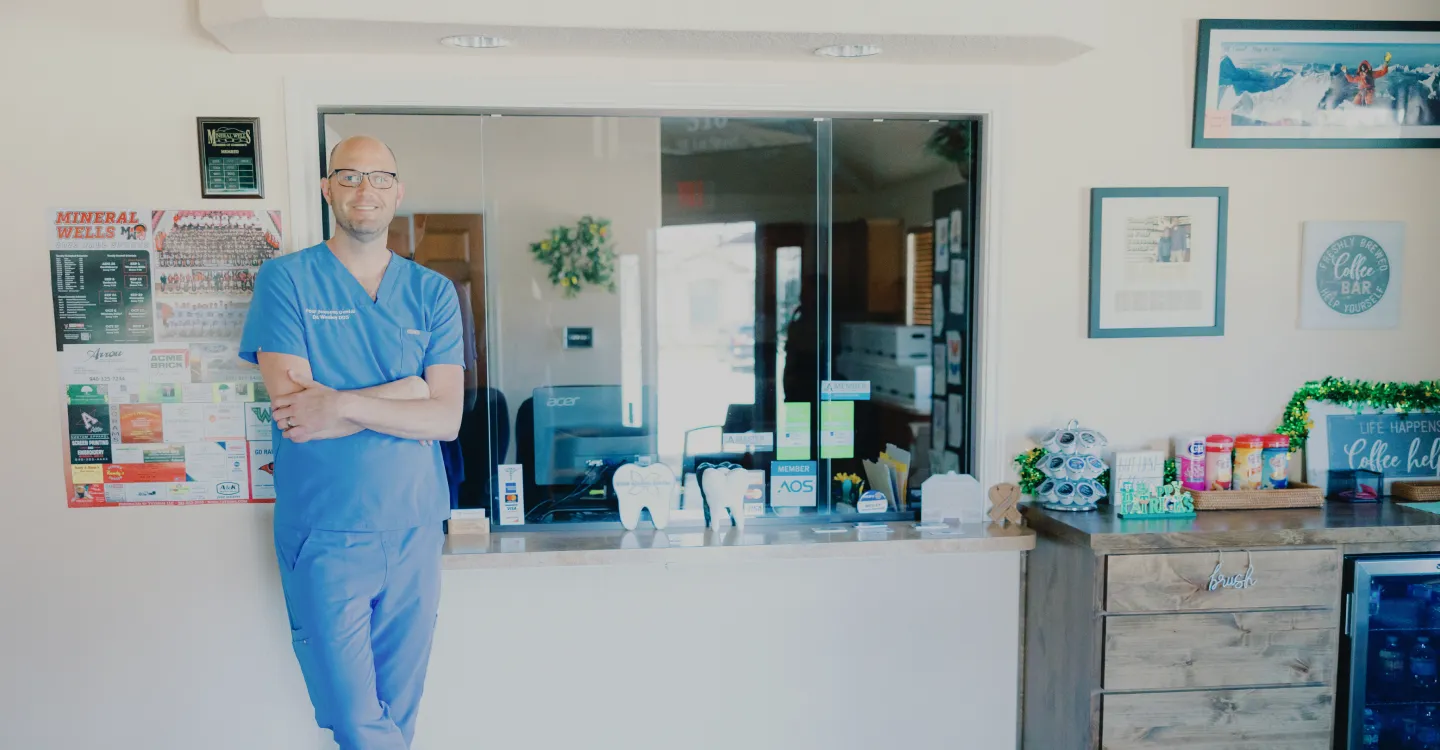 Mineral Wells dentist, Dr. Wesley, connecting with a local family.